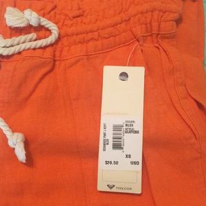 New with tags orange Roxy draw string linen pants.
